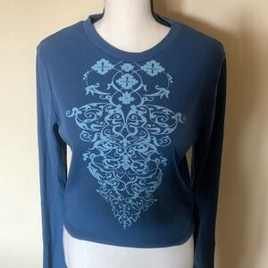 90’s Y2K long sleeve blue shirt . Design on front . Fits size small to medium